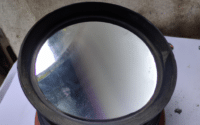 DALL·E-2022-12-16-15.28.39-clean-and-dirty-telescope-mirror